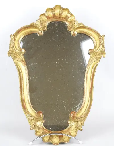 Miroir en bois scuplté XIXème, petite taille,  donc très facile à placer. 50x35               19th century carved wooden mirror small size, therefore easy to place