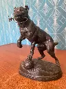 Sculpture ancienne en régule,  porte montre signé Charles Valton, fin XIXème.                                        Antique spelter sculpture, watch holder signed Charles Valton, late 19th century.